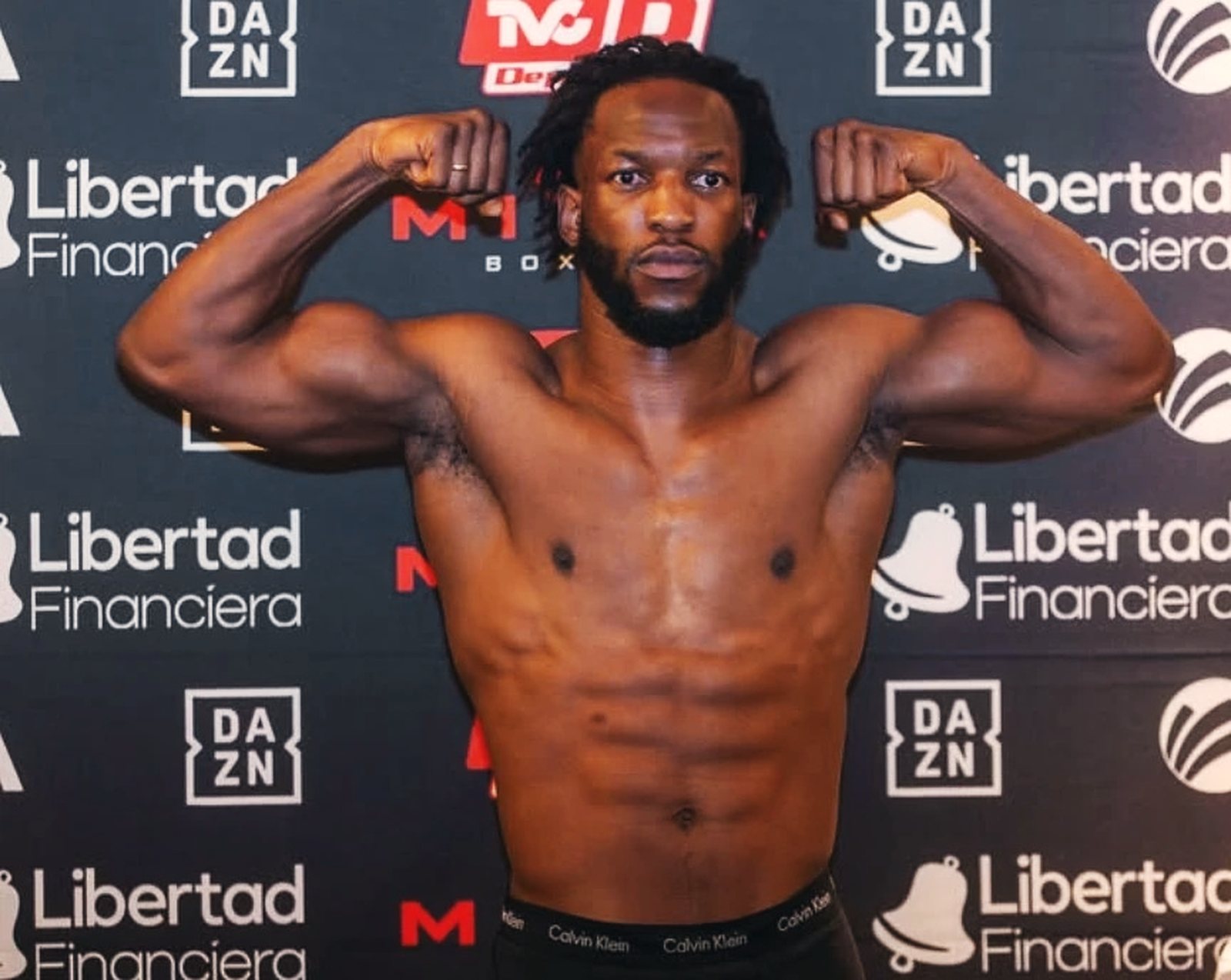 Kevin Boakye on the scale at a weigh-in